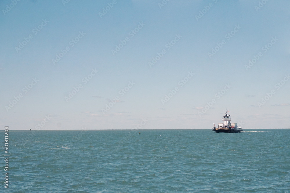 Ferry Boat and Buoy on Sound Water in Sunlight Ferry Boat and Buoy on Sound Water in Sunlight
