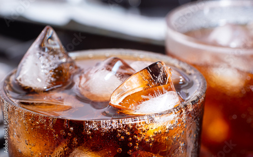 cola with crushed ice in gl...
