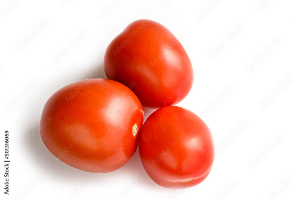 Three red tomatoes isolated on a white background Three red tomatoes isolated on a white background