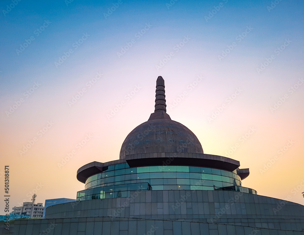 buddha stupa with bright colorful evening sky at dusk from different angle buddha stupa with bright colorful evening sky at dusk from different angle