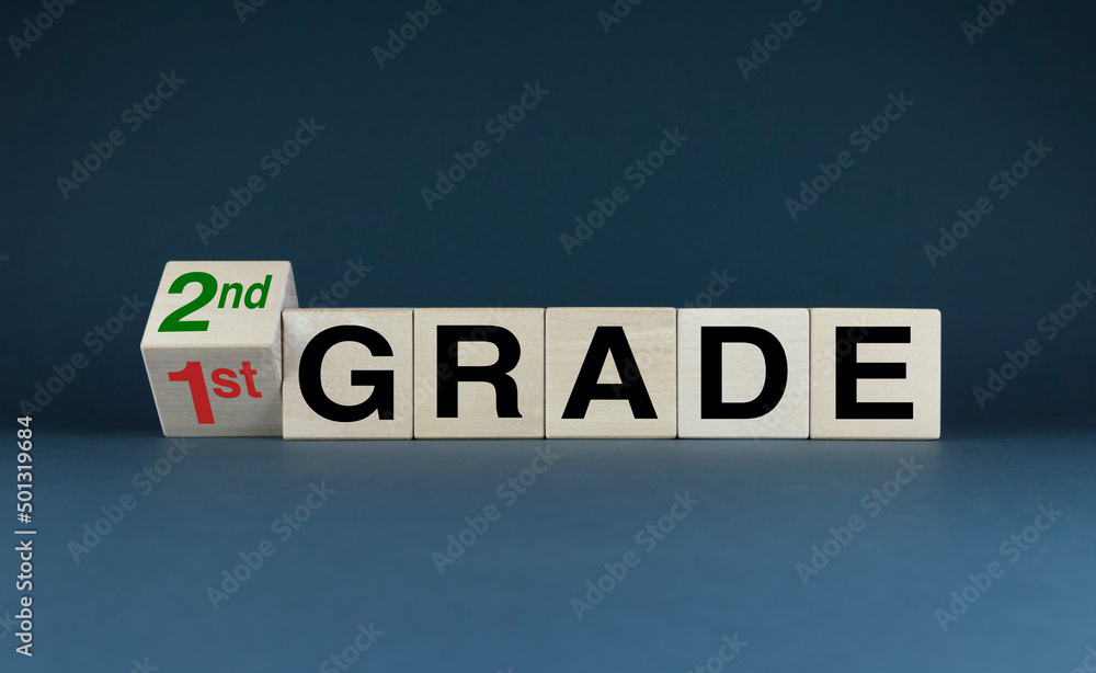 Obraz premium Cubes form the words 1st grade to 2nd grade.