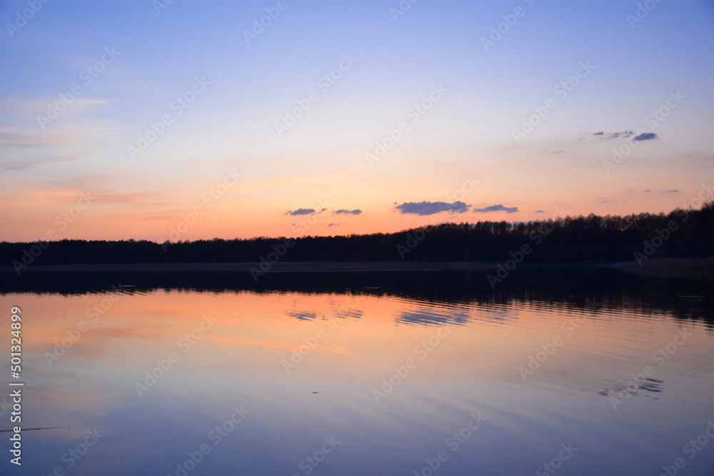 Sunset reflected on the surface of the lake