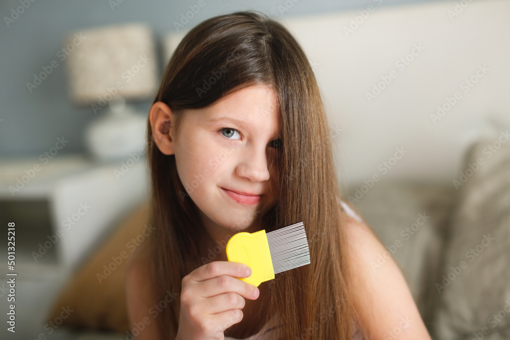 Long-haired European girl child with lice comb, protection. Health and pharmaceutical concept, child health problems. doctor checks child's hair, head lice, possible lice infection. Long-haired European girl child with lice comb, protection. Health and pharmaceutical concept, child health problems. doctor checks child's hair, head lice, possible lice infection.