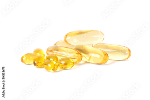 Vitamin D. Yellow pills slide isolated on white background. Vitamins are antibiotics. Omega 3.