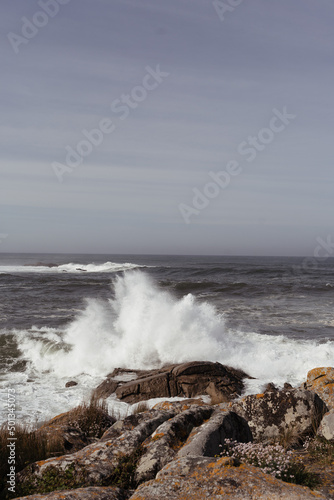 waves crushing on the rocks