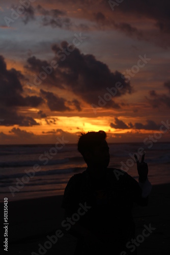 person watching sunset