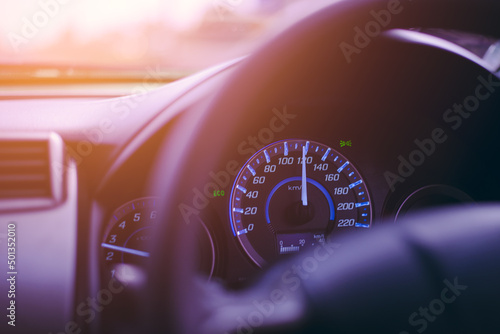 Closeup dashboard of mileage driving a car 
