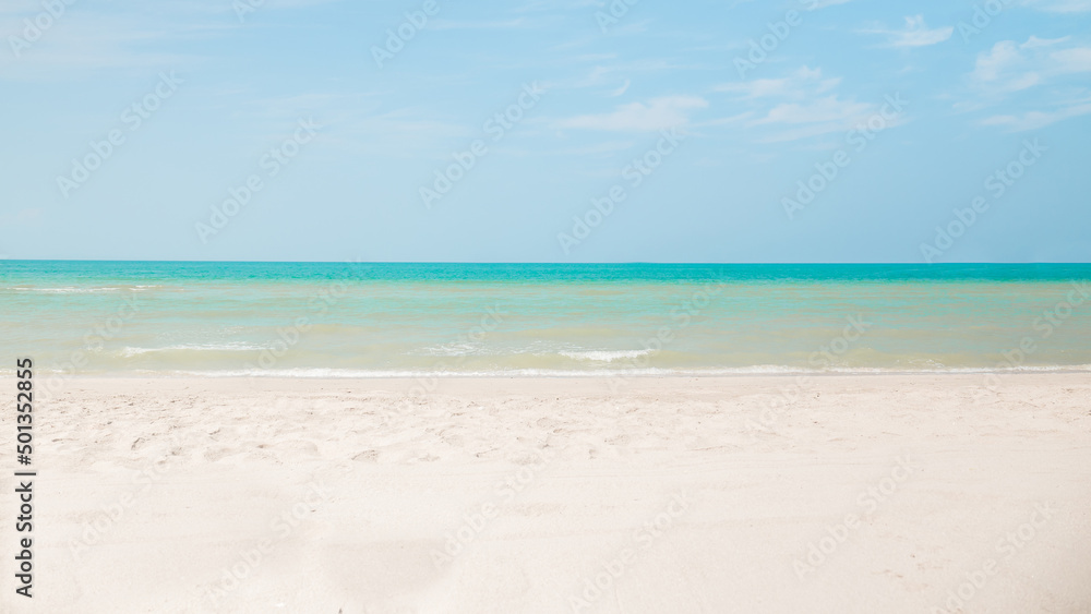 Beach sand sea water summer background. Sand beach desert texture.
White foam wave sandy seashore