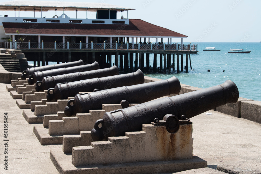 Zanzibar City, Tanzania - April 24,2022: View on architecture of Stone town in Zanzibar City. Zanzibar City, Tanzania - April 24,2022: View on architecture of Stone town in Zanzibar City.