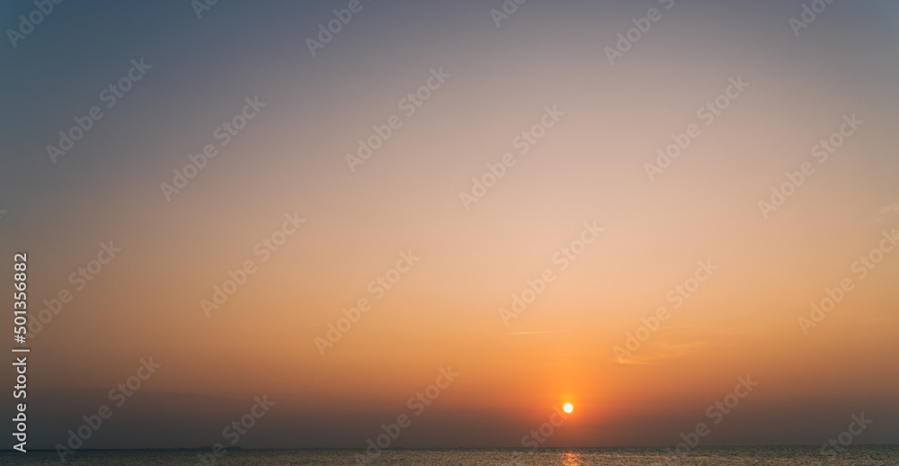 Dusk sky over sea in the evening on twilight sky background Dusk sky over sea in the evening on twilight sky background