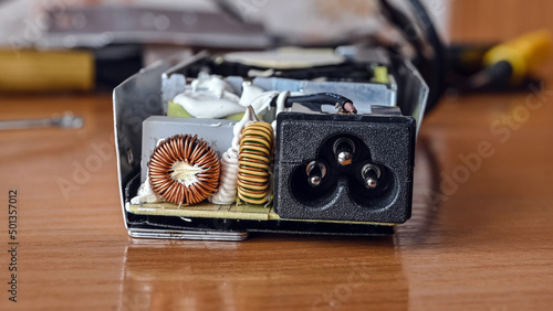 laptop power supply repair, disassembled power supply, close-up