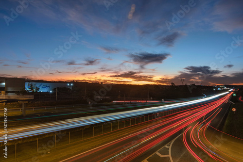 Traffic lights on the freeway at sunset. Long exposure. D. Pedro I highway, Atibaia, Brazil.
