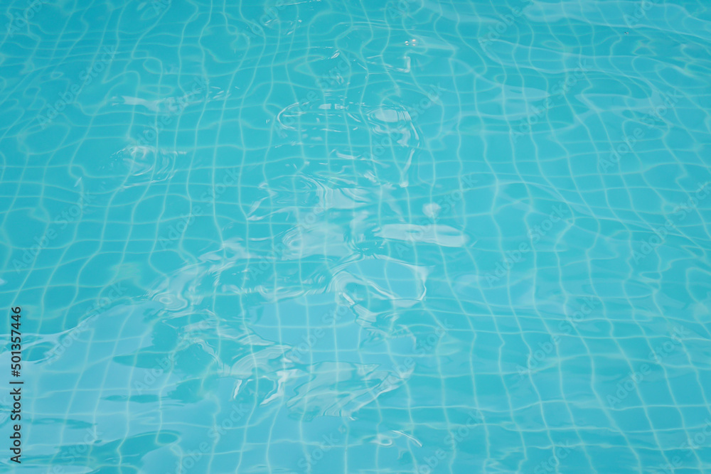Obraz premium Swimming pool floor with water ripple. Blue texture background.