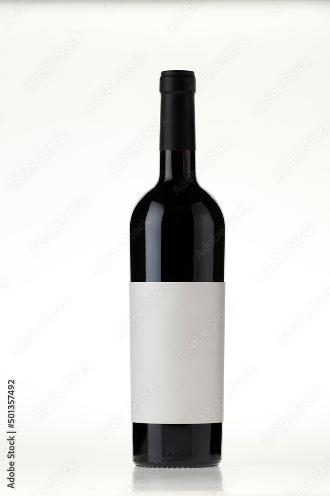 red wine bottle with blank label on isolated white background red wine bottle with blank label on isolated white background