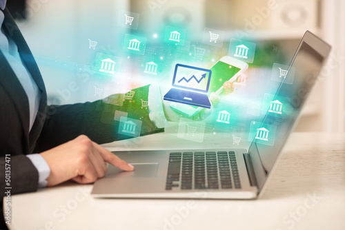 Wallpaper Mural Businessman working on laptop with new business Torontodigital.ca