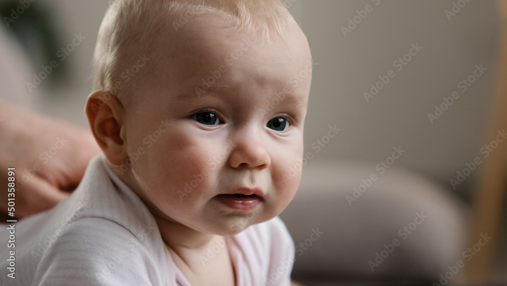 Close up child emotional sad face smiling baby expression little infant smiles with nice cute laugh three months age newborn care and love small kid cheerful son daughter adoption pediatric healthcare