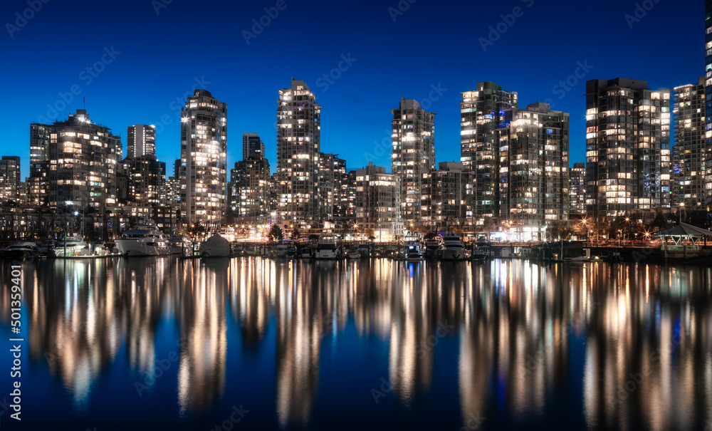 Fototapeta premium False Creek with modern city buildings at night after sunset. Downtown Vancouver Cityscape, British Columbia, Canada. Panorama