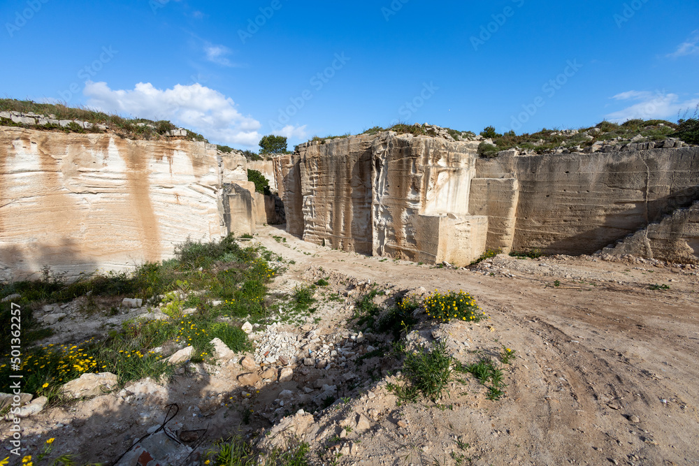 Calcarenite quarries. Characteristic limestone landscape of the sea coast of Favignana, (Egadi) Aegadian Islands, Trapani, Sicily, Italy