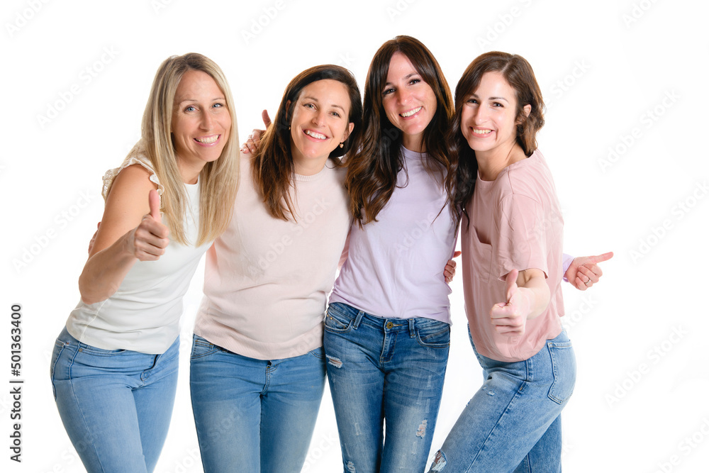 Portrait Of Four best friends Women In Studio Standing with positive thumb up Portrait Of Four best friends Women In Studio Standing with positive thumb up