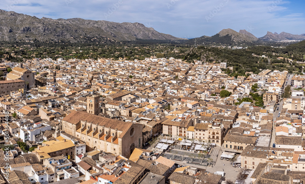aerial view of the village with the  parish of Mare de Deu dels Angels in the foreground, Pollensa, Majorca, Balearic Islands, Spain
