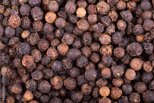 closeup background of black pepper seeds texture