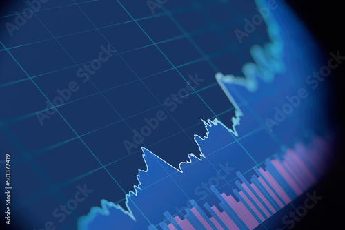 Abstract financial graph with up trend line chart in stock market on blue color background 