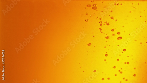 Macro photo of bubbling beer  closeup.