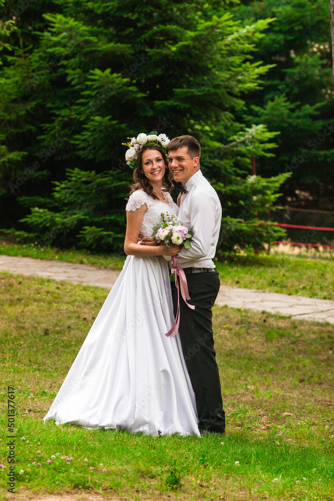 Fototapeta premium Happy bride and groom after wedding ceremony