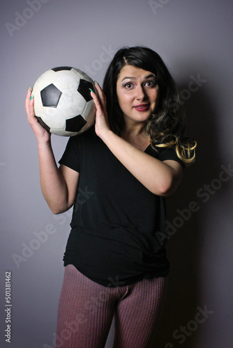 woman with soccer ball making facial expressions © SaraSRosado