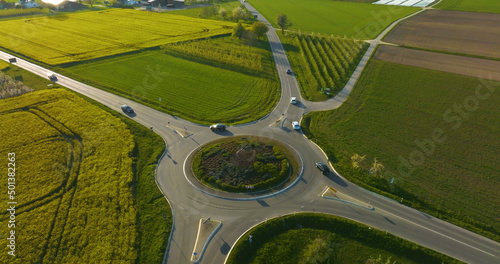 Roundabout with cars surrounded by greenery in Germany photo