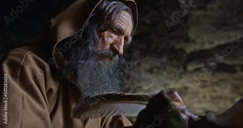 Obraz na plátně Monk chronicler writes an ancient manuscript