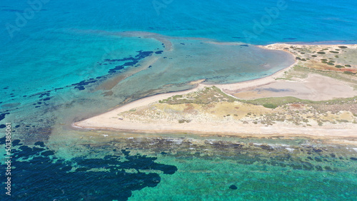 Aerial drone photo of small uninhibited island of Metopi near Aigina island, Saronic gulf, Greece