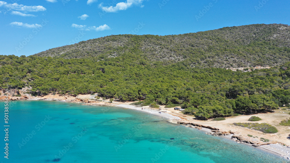 Aerial drone photo of paradise bay and turquoise beach of Dragonera covered in pine trees in small island of Agistri, Greece Aerial drone photo of paradise bay and turquoise beach of Dragonera covered in pine trees in small island of Agistri, Greece
