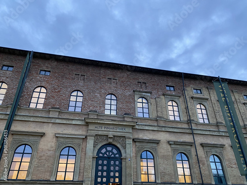 Exterior of the Alte Pinakothek Museum against a cloudy sky in Munich, Germany photo