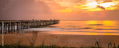 Beautiful view of Flagler Beach Fishing Pier at sunrise in Florida, USA