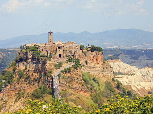 View of village called CIVITA DI BAGNOREGIO in Italy Italy and the very long footbridge © ChiccoDodiFC