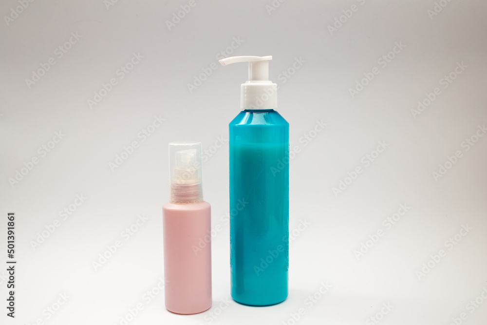 Blue can of shampoo on a white background Blue can of shampoo on a white background