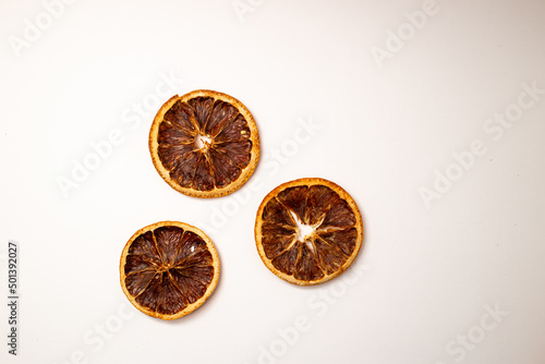 Dried fruit  fruit and cinnamon on white background