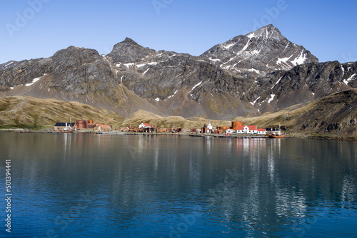 A beautiful view of a lake with Grytviken settlement and abandoned Whaling station photo