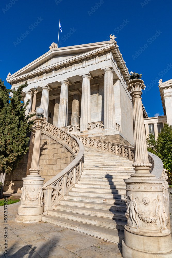 Vallianeio Megaron entrance and stairs, sunny day, blue sky. The historic building housed the National Library until 2017, Athens, Greece