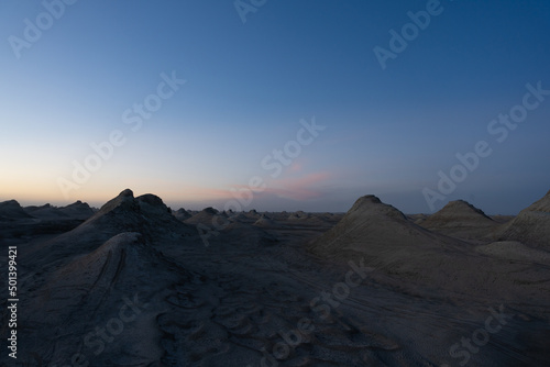 Beautiful view of yardang landform landscape during sunset photo