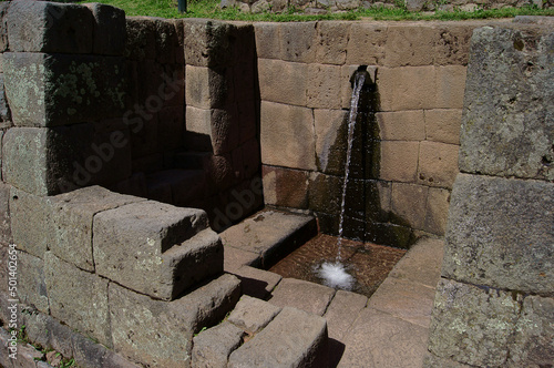 Beautiful shot of the Inca water fountain at Tipon Archaeological Site during daytime in Cusco, Peru photo