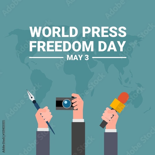 World press freedom day design with hand holding news microphone, pen and camera, on world map background.