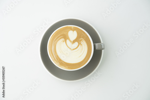 Top view of a cup of cappuccino over a white background Fototapet