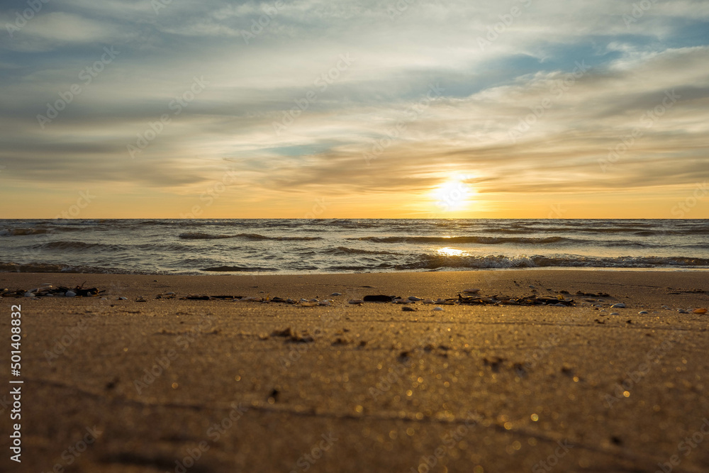 Baltic sea coast at colorful summer sunset