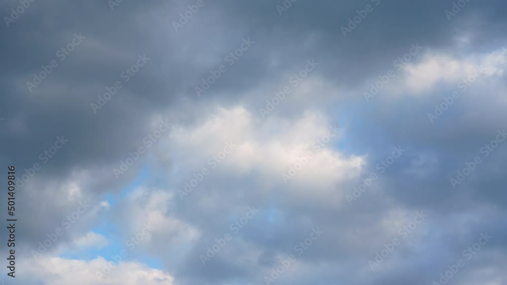 Timelapse video, clouds moving over almost completely overcast sky Timelapse video, clouds moving over almost completely overcast sky