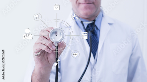 Medicine doctor and stethoscope in hand touching icon medical network connection with modern virtual screen interface, medical technology concept Doctor using digital medical futuristic interface.