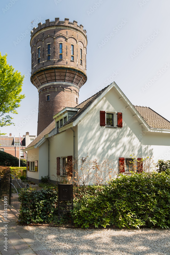 Former water tower in the Dutch village of Baarn, built in 1903. The tower has a height of 29 meters and a water reservoir with a volume of 500 m3. The tower is now used as a residence.