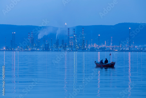 TUPRAS (Turkish Petroleum Refineries Corporation) in Izmit, Kocaeli, Turkey. TUPRAS facilities sunset view. photo