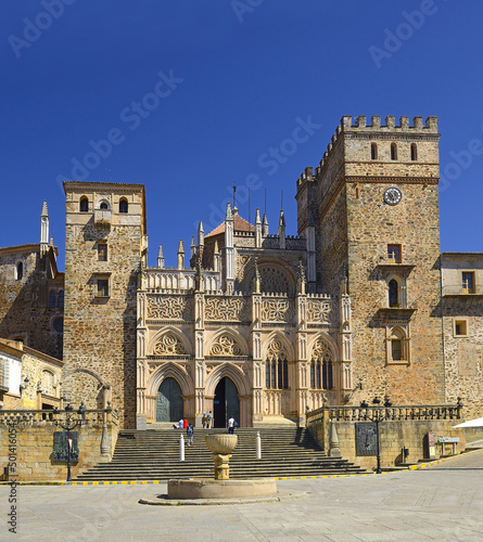 Mudejar cloister, Royal Monastery of Santa Maria de Guadalupe, province of Caceres, Extremadura, Spain - UNESCO World Heritage Site. Overview of the main facade and the square photo